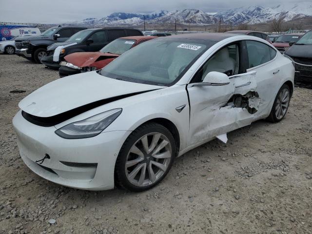 TESLA MODEL 3 2018 with VIN 5YJ3E1EB3JF112311 - Photo from auction