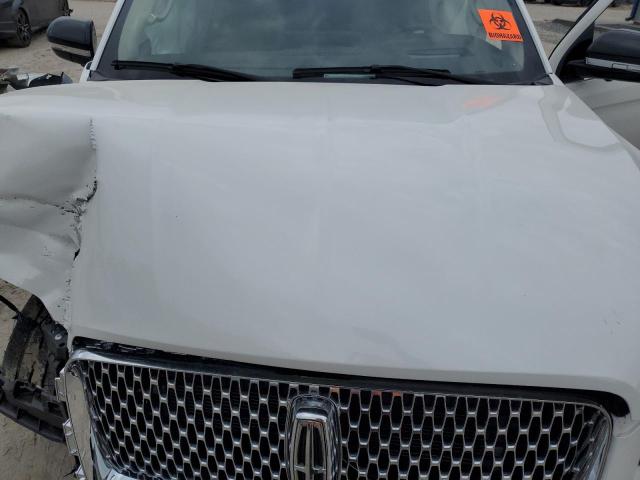 Photo 12 from auction – 2024 LINCOLN NAVIGATOR with VIN 5LMJJ2LG2REL10830