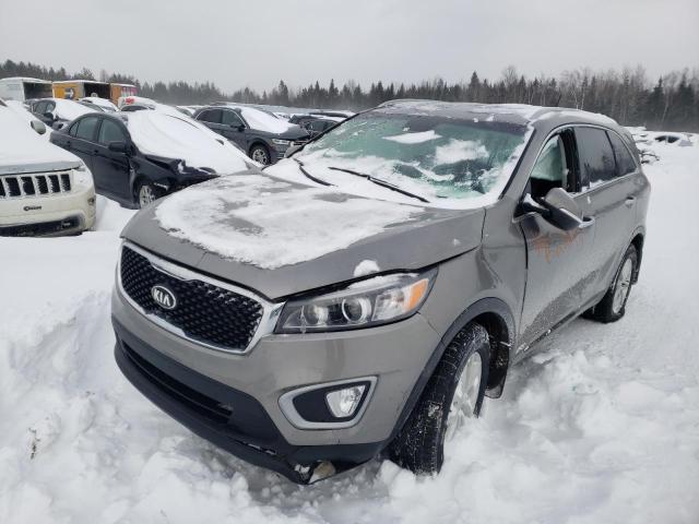 KIA SORENTO LX 2018 with VIN 5XYPGDA38JG377293 - Photo from auction