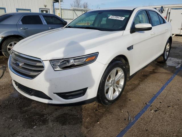 FORD TAURUS SEL 2015 with VIN 1FAHP2E8XFG112528 - Photo from auction