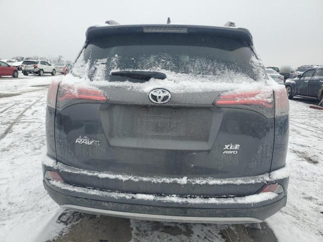 Photo 6 from auction – 2017 TOYOTA RAV4 XLE with VIN JTMRFREV8HJ700627
