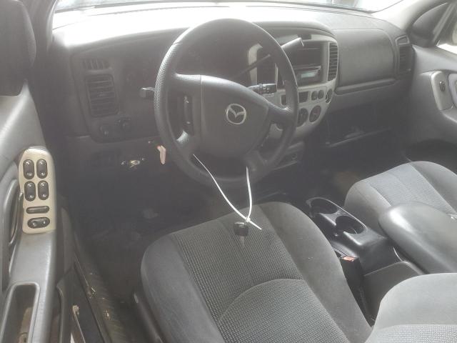 Photo 8 from auction – 2003 MAZDA TRIBUTE LX with VIN 4F2YZ04143KM01619