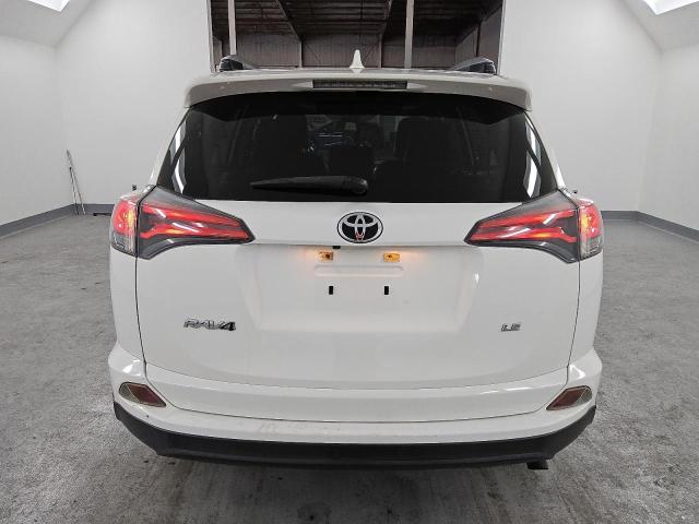 Photo 6 from auction – 2017 TOYOTA RAV4 LE with VIN JTMZFREV5HJ130019