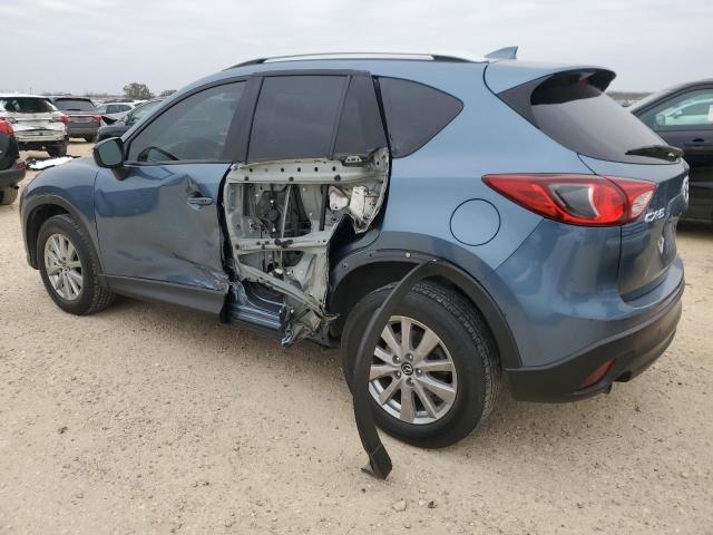 Photo 2 from auction – 2016 MAZDA CX-5 TOURI with VIN JM3KE2CY4G0900831