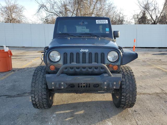 Photo 5 from auction – 2013 JEEP WRANGLER U with VIN 1C4BJWEG9DL532219
