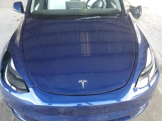 Photo 11 from auction – 2023 TESLA MODEL Y with VIN 7SAYGDEF1PF865688