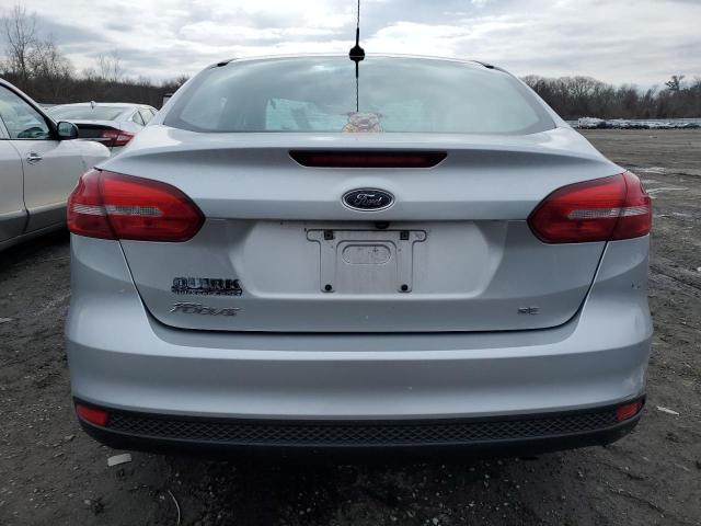 Снимка 6 от търг – 2018 FORD FOCUS SE с VIN 1FADP3F20JL283738