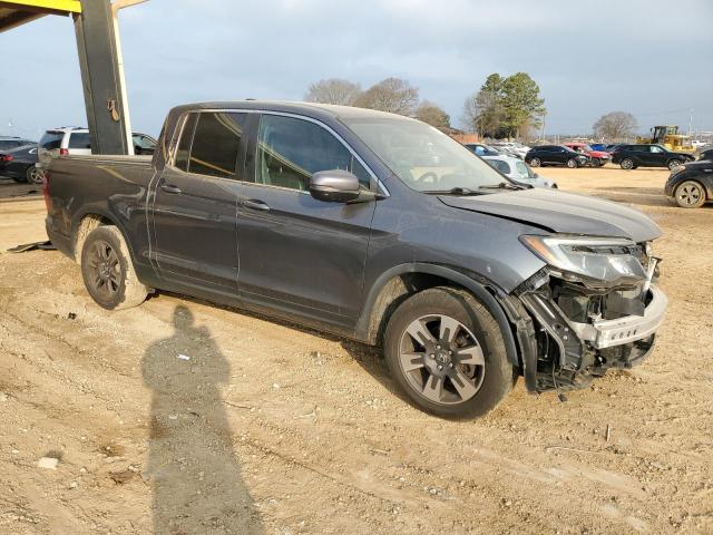 Photo 4 from auction – 2017 HONDA RIDGELINE with VIN 5FPYK2F58HB009867