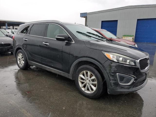 Photo 4 from auction – 2016 KIA SORENTO LX with VIN 5XYPG4A54GG011356