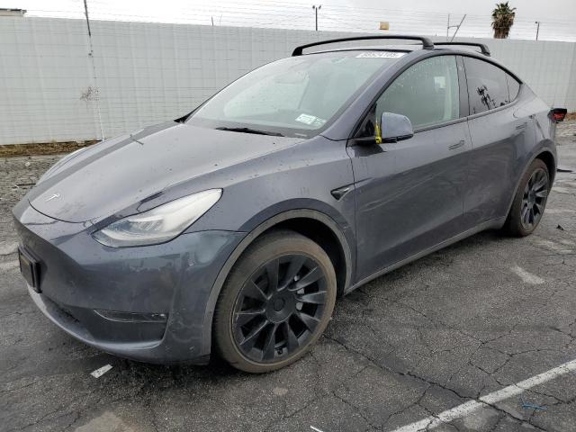 TESLA MODEL Y 2021 with VIN 5YJYGAEE9MF180613 - Photo from auction