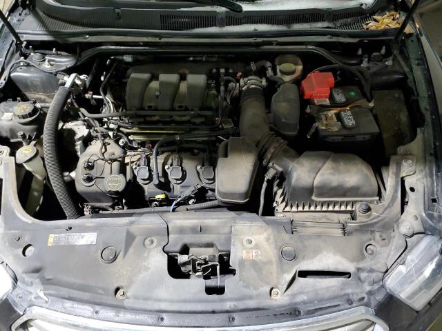 Photo 11 from auction – 2015 FORD TAURUS SEL with VIN 1FAHP2H82FG188384
