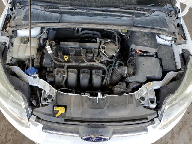 Photo 11 from auction – 2014 FORD FOCUS with VIN 1FADP3F23EL335546