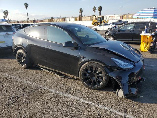 Photo 4 from auction – 2022 TESLA MODEL Y with VIN 7SAYGDEE1NF481155