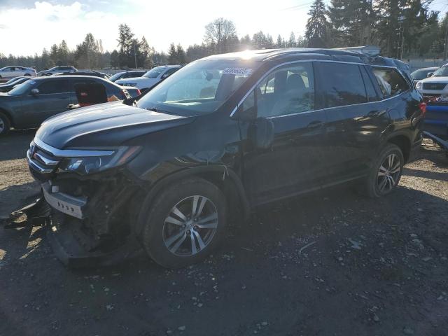 HONDA PILOT EXL 2018 with VIN 5FNYF6H57JB014520 - Photo from auction