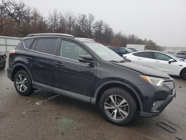 Photo 4 from auction – 2016 TOYOTA RAV4 XLE with VIN 2T3RFREV7GW470014
