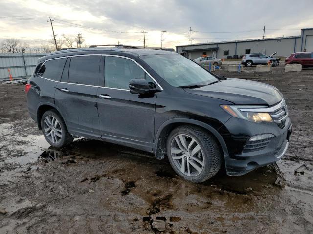 Photo 4 from auction – 2018 HONDA PILOT TOUR with VIN 5FNYF6H90JB042422