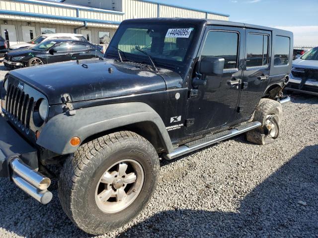 JEEP WRANGLER U 2009 with VIN 1J4GA39199L733727 - Photo from auction