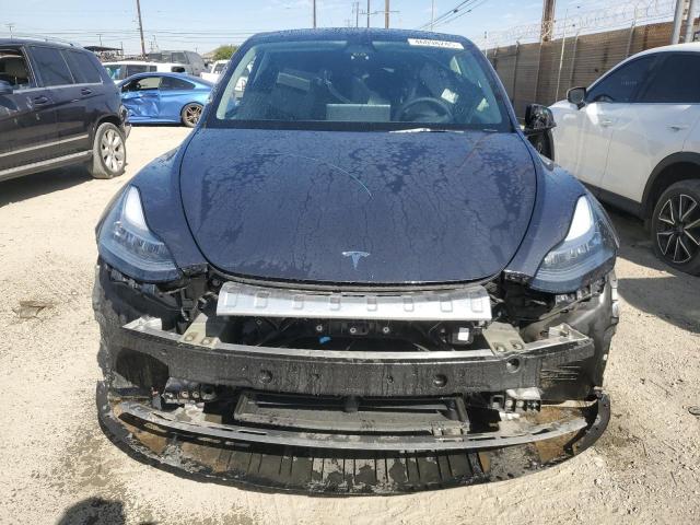Снимка 5 от търг – 2022 TESLA MODEL Y с VIN 7SAYGAEE4NF346346