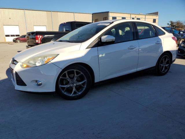 FORD FOCUS SE 2014 with VIN 1FADP3F25EL276595 - Photo from auction