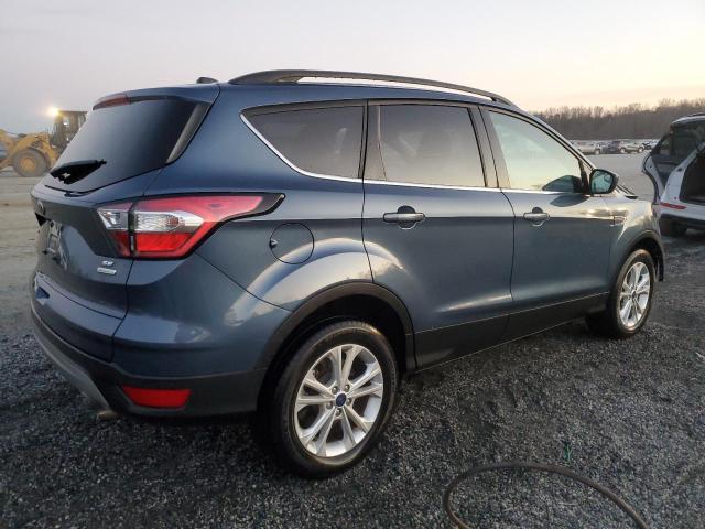 Photo 3 from auction – 2018 FORD ESCAPE SE with VIN 1FMCU0GD3JUA60712