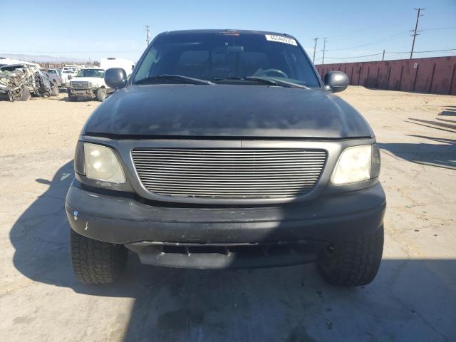 Photo 5 from auction – 2003 FORD F150 SUPER with VIN 1FTRW07L83KC58930