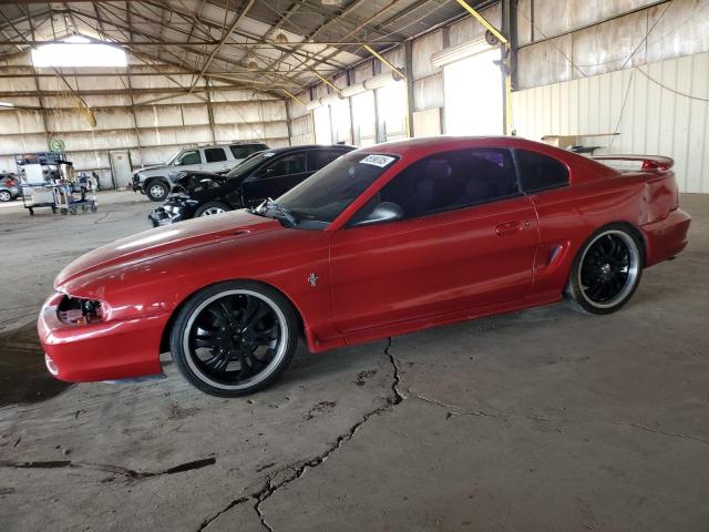 FORD MUSTANG 1998 with VIN 1FAFP4047WF118865 - Photo from auction