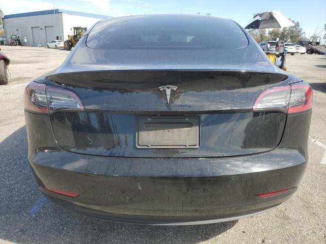 Снимка 6 от търг – 2021 TESLA MODEL 3 с VIN 5YJ3E1EA9MF074837