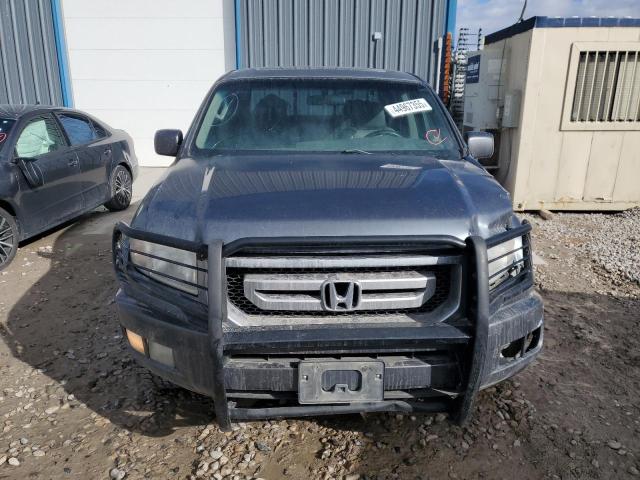 Photo 5 from auction – 2010 HONDA RIDGELINE with VIN 5FPYK1F58AB006922
