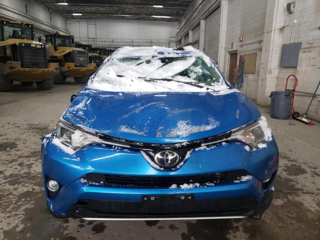 Photo 5 from auction – 2017 TOYOTA RAV4 XLE with VIN 2T3RFREV5HW680113