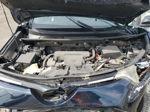 Photo 12 from auction – 2018 TOYOTA RAV4 LE with VIN JTMZFREV0JJ156775