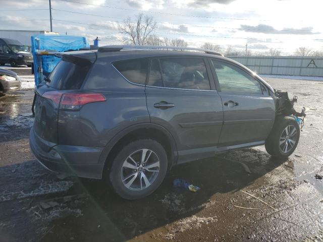 Photo 3 from auction – 2017 TOYOTA RAV4 XLE with VIN JTMWFREV9HJ104560