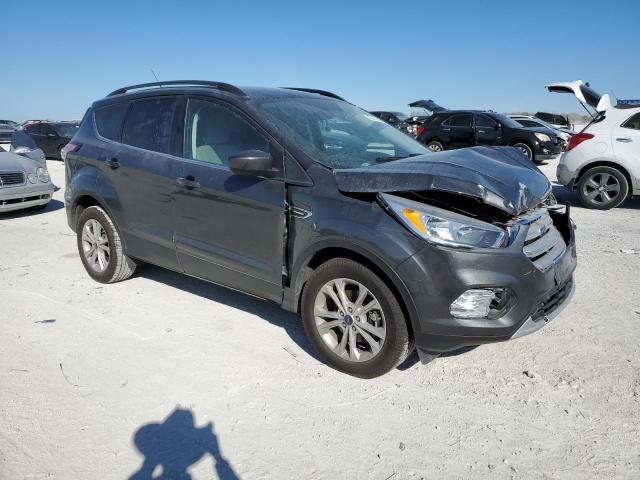 Photo 4 from auction – 2018 FORD ESCAPE SE with VIN 1FMCU0GD6JUD15014