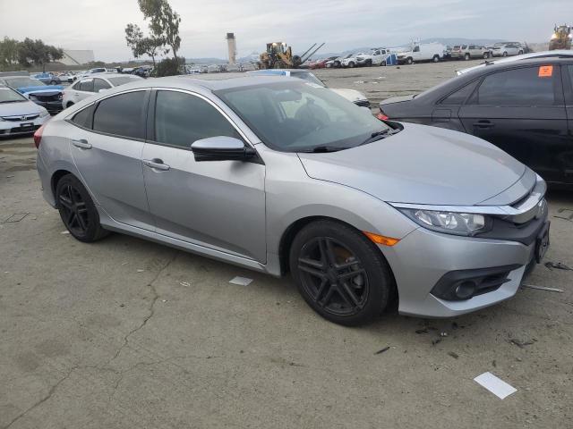 Photo 4 from auction – 2016 HONDA CIVIC EX with VIN 19XFC1F30GE214495