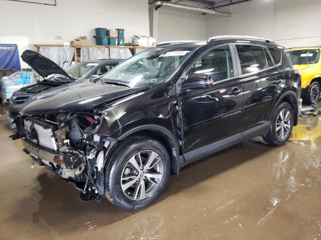 TOYOTA RAV4 XLE 2017 with VIN 2T3RFREV8HW677559 - Photo from auction