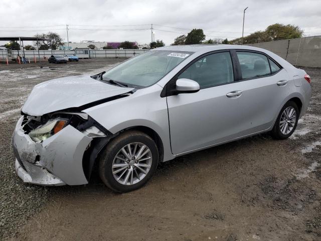 TOYOTA COROLLA L 2014 with VIN 5YFBURHE0EP102011 - Photo from auction