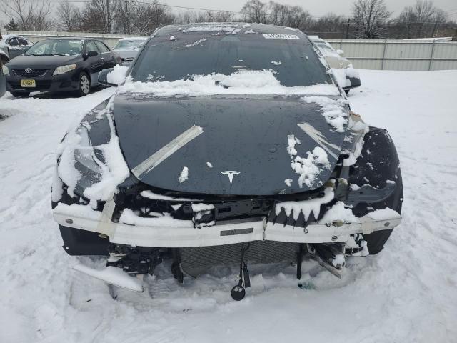 Photo 5 from auction – 2021 TESLA MODEL 3 with VIN 5YJ3E1EA3MF059833
