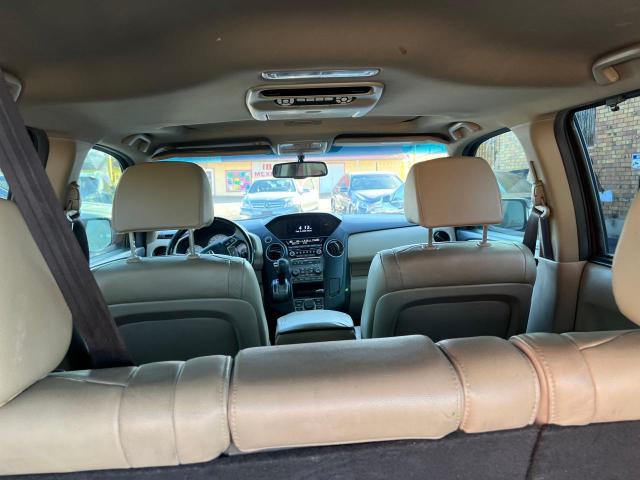 Photo 9 from auction – 2014 HONDA PILOT TOUR with VIN 5FNYF3H95EB001451