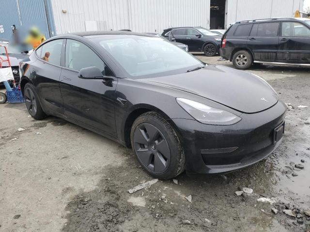 Photo 4 from auction – 2023 TESLA MODEL 3 with VIN 5YJ3E1EA1PF508981