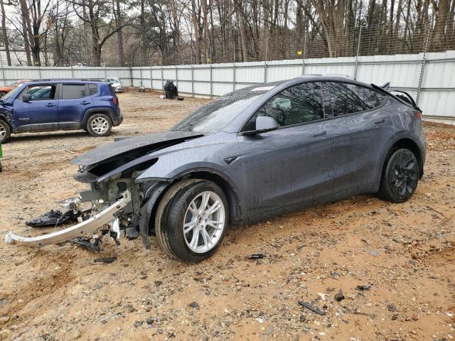 TESLA MODEL Y 2023 с VIN 7SAYGDEE9PA164336 - Снимка от търг