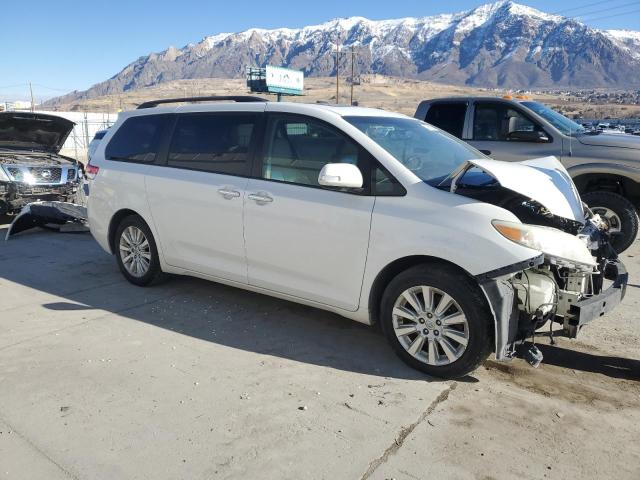 Photo 4 from auction – 2014 TOYOTA SIENNA XLE with VIN 5TDYK3DC0ES520688