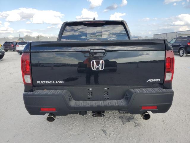 Photo 6 from auction – 2023 HONDA RIDGELINE with VIN 5FPYK3F57PB057879