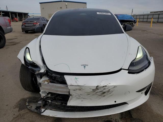 Photo 5 from auction – 2021 TESLA MODEL 3 with VIN 5YJ3E1EA6MF066002