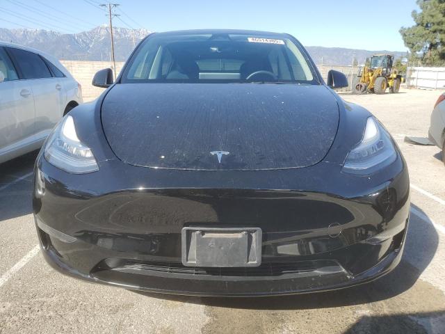 Photo 5 from auction – 2023 TESLA MODEL Y with VIN 7SAYGDEE4PA025344
