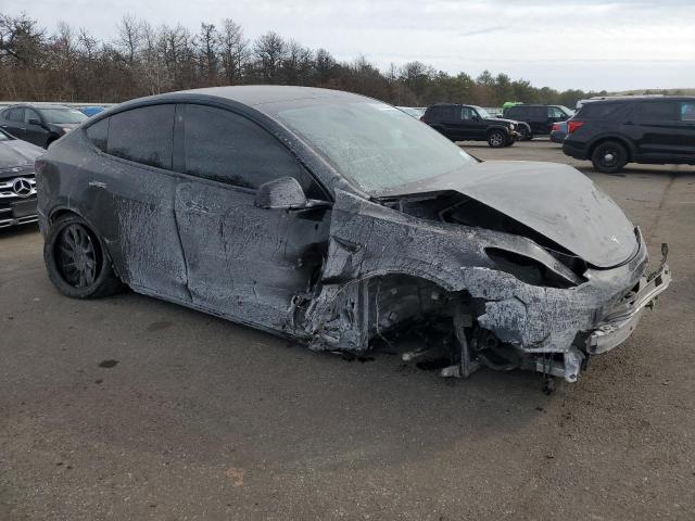 Снимка 4 от търг – 2023 TESLA MODEL Y с VIN 7SAYGDEE0PF690275