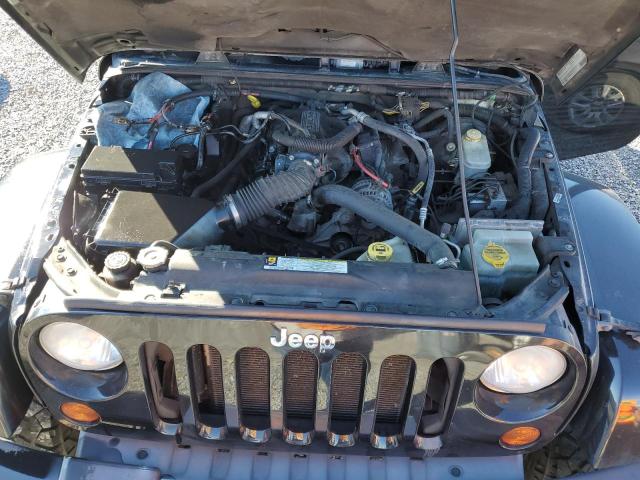 Photo 12 from auction – 2011 JEEP WRANGLER U with VIN 1J4BA5H13BL635449