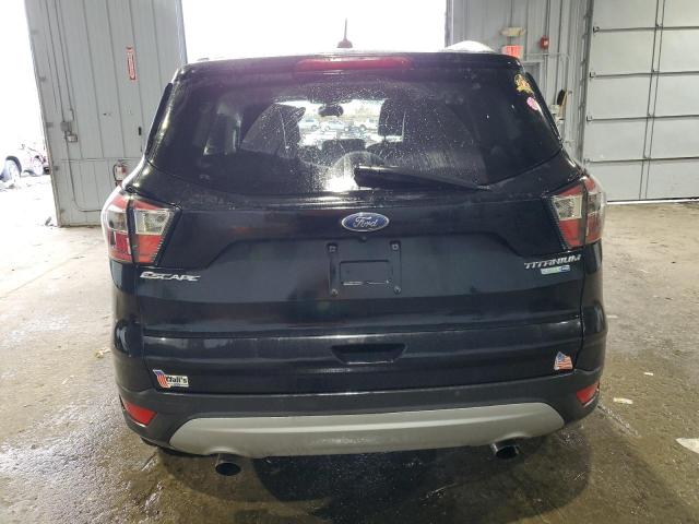 Photo 6 from auction – 2017 FORD ESCAPE TIT with VIN 1FMCU9J98HUC05746