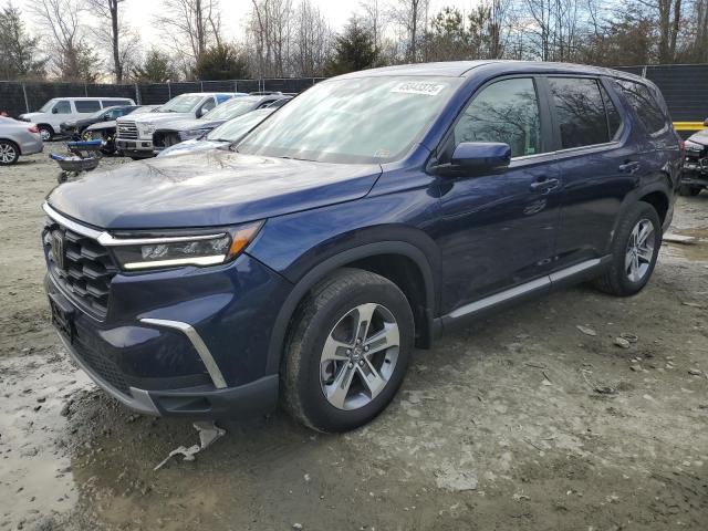 HONDA PILOT EXL 2023 with VIN 5FNYG1H41PB046802 - Photo from auction