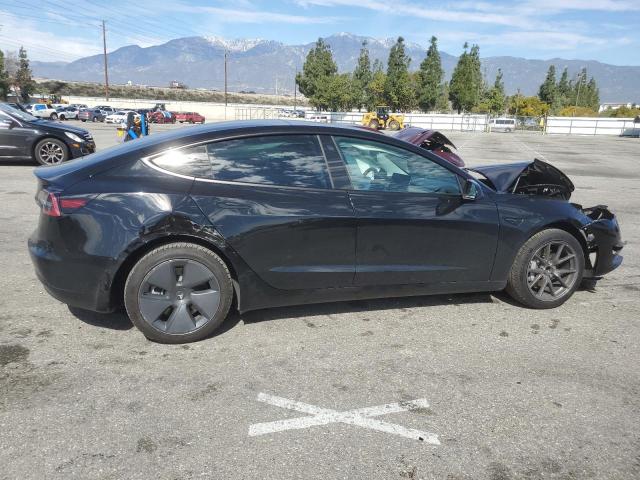 Снимка 3 от търг – 2021 TESLA MODEL 3 с VIN 5YJ3E1EA9MF074837