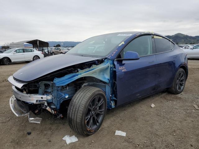 TESLA MODEL Y 2024 with VIN 7SAYGDED7RF181553 - Photo from auction