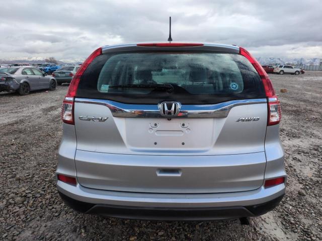 Photo 6 from auction – 2015 HONDA CR-V LX with VIN 5J6RM4H34FL078011